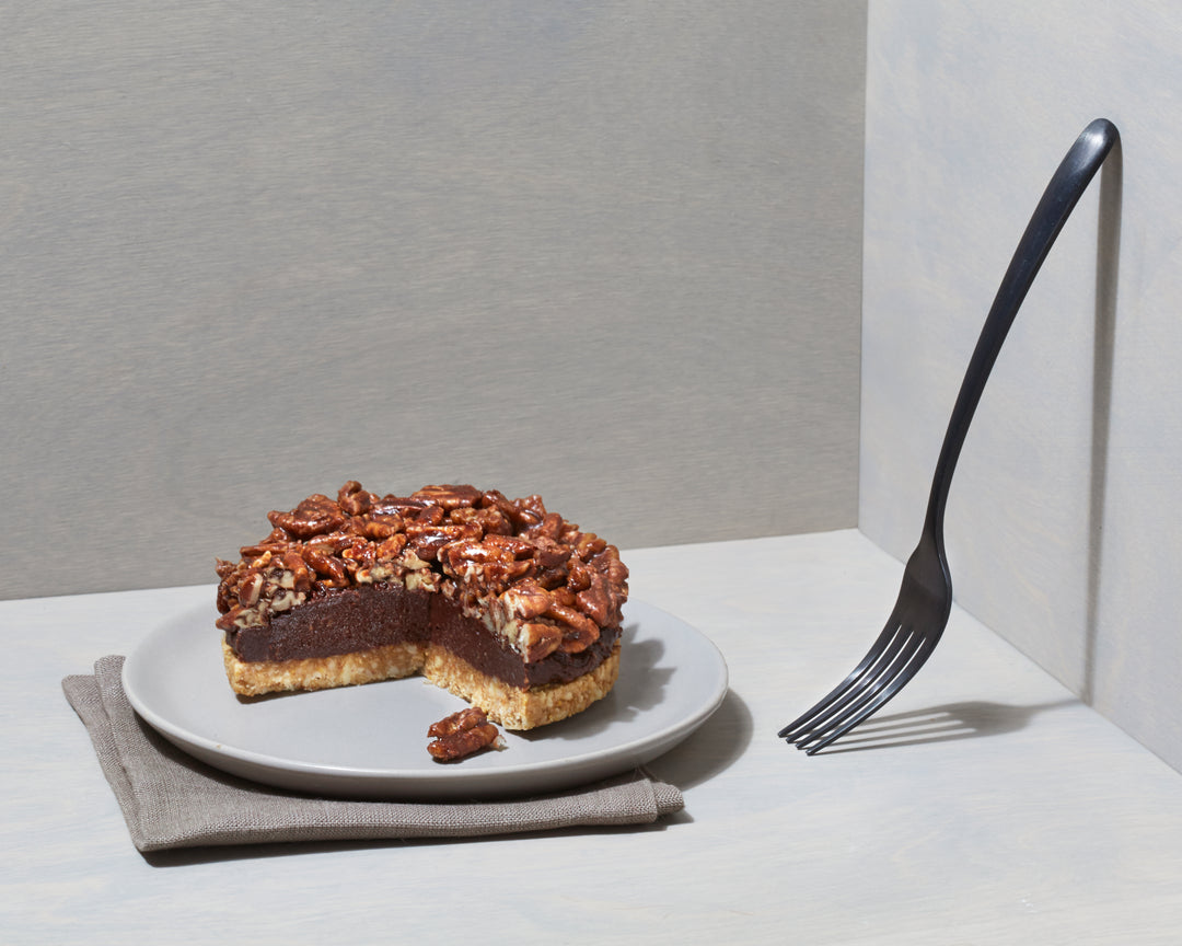 Raw vegan chocolate tart with sprouted walnuts.