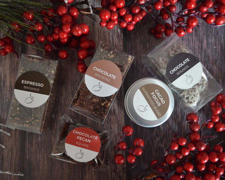 Vegan chocolate treats, sprouted nuts delights and organic superfoods with holiday berries.