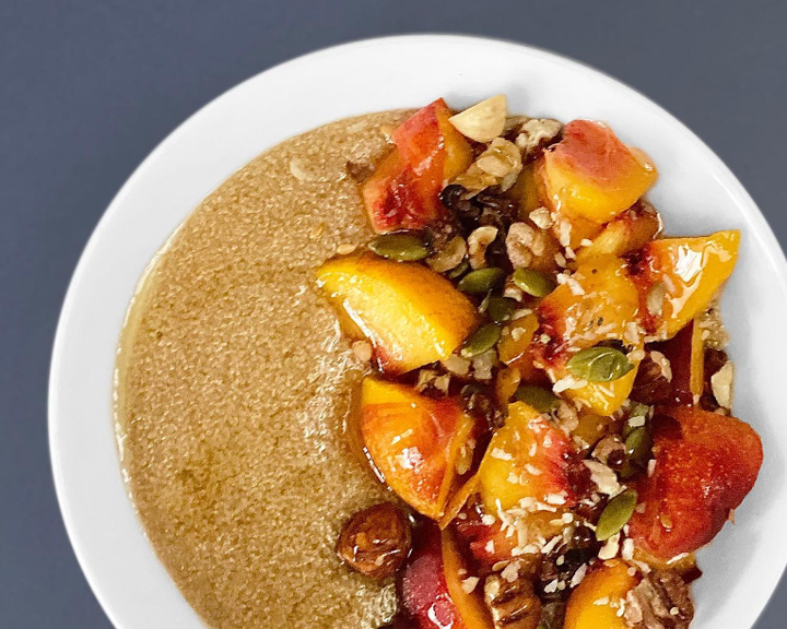 Bowl with gluten free amaranth and organic superfood granola.
