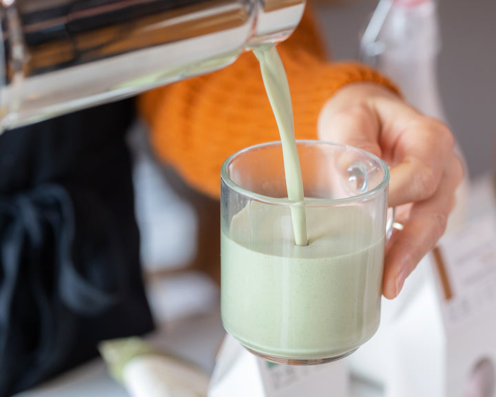 Photo of pouring matcha organic superfoods matcha latte blend.