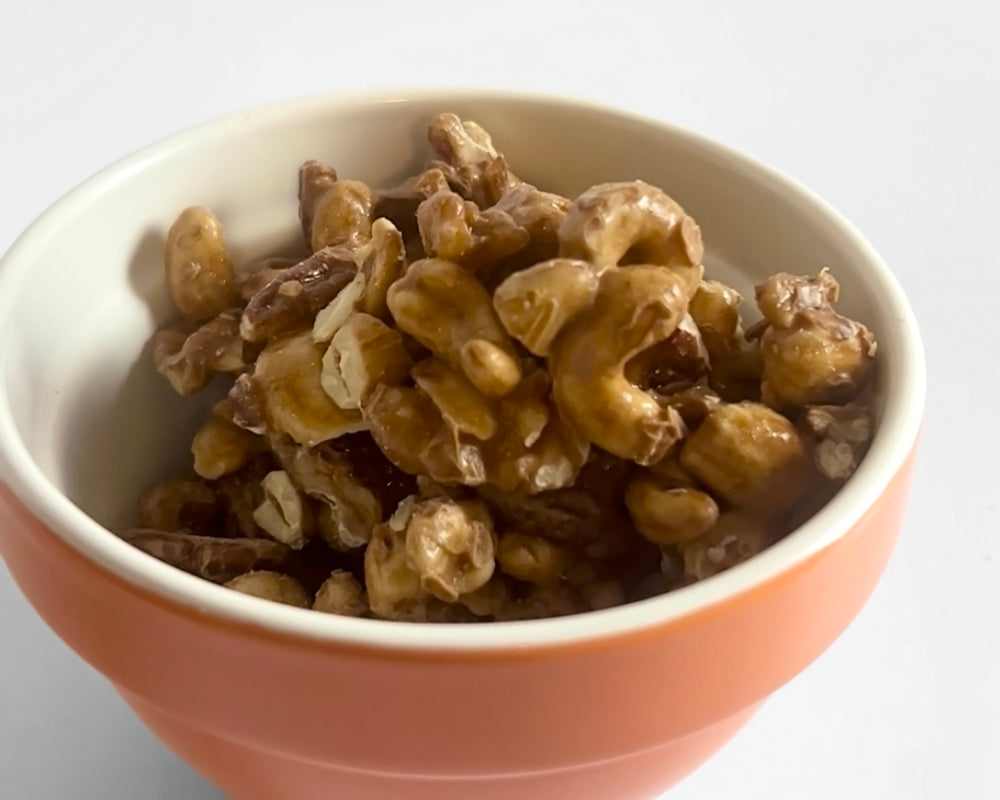 Photo of sprouted nut cluster in a bowl.