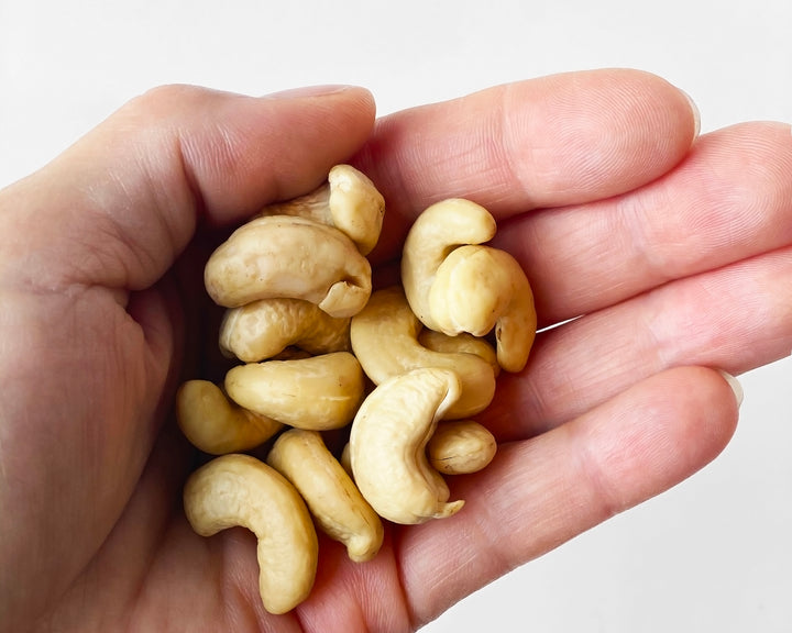 Handful of sprouted nuts of cashews image.