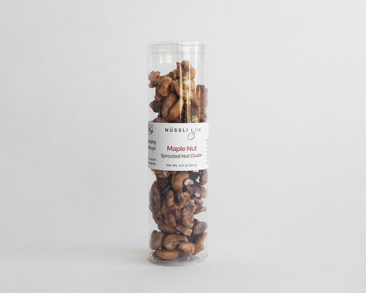 Photo of sprouted nut maple nut clusters in a container.